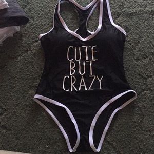 Black one piece swimsuit.